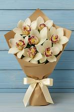 Букет 7 белых орхидей в Петропавловске-Камчатском Букет цветов из:  Орхидеи и Розы в Петропавловске-Камчатском